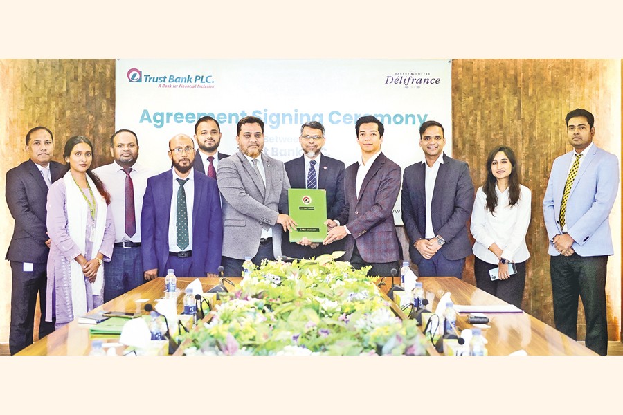 TRUST BANK PLC AND LES BLEUS LTD SIGN MOU