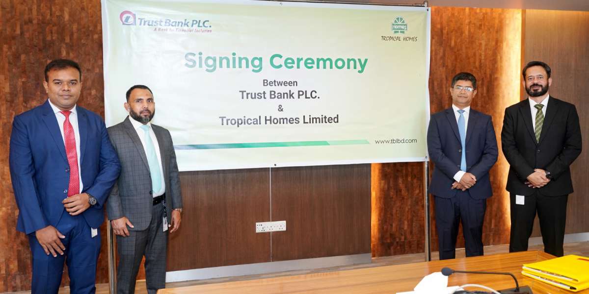 Agreement Signing between Trust Bank PLC and Tropical Homes Limited on 18 November 2024.