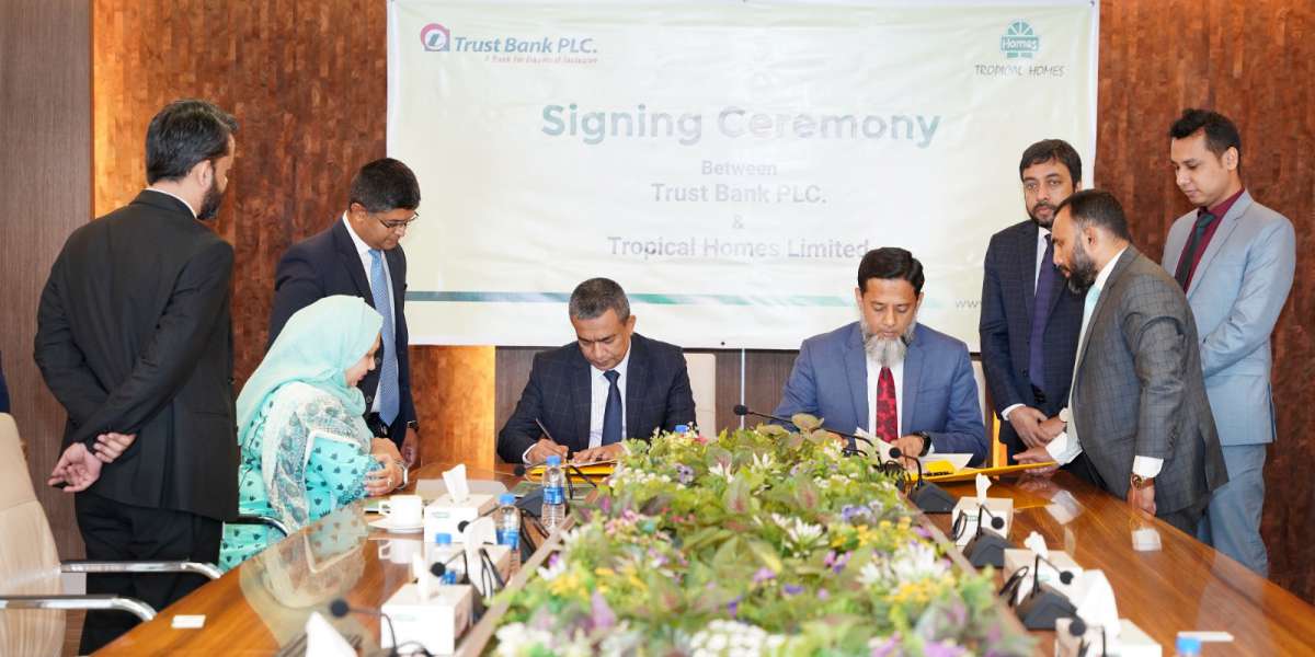 Agreement Signing between Trust Bank PLC and Tropical Homes Limited on 18 November 2024.