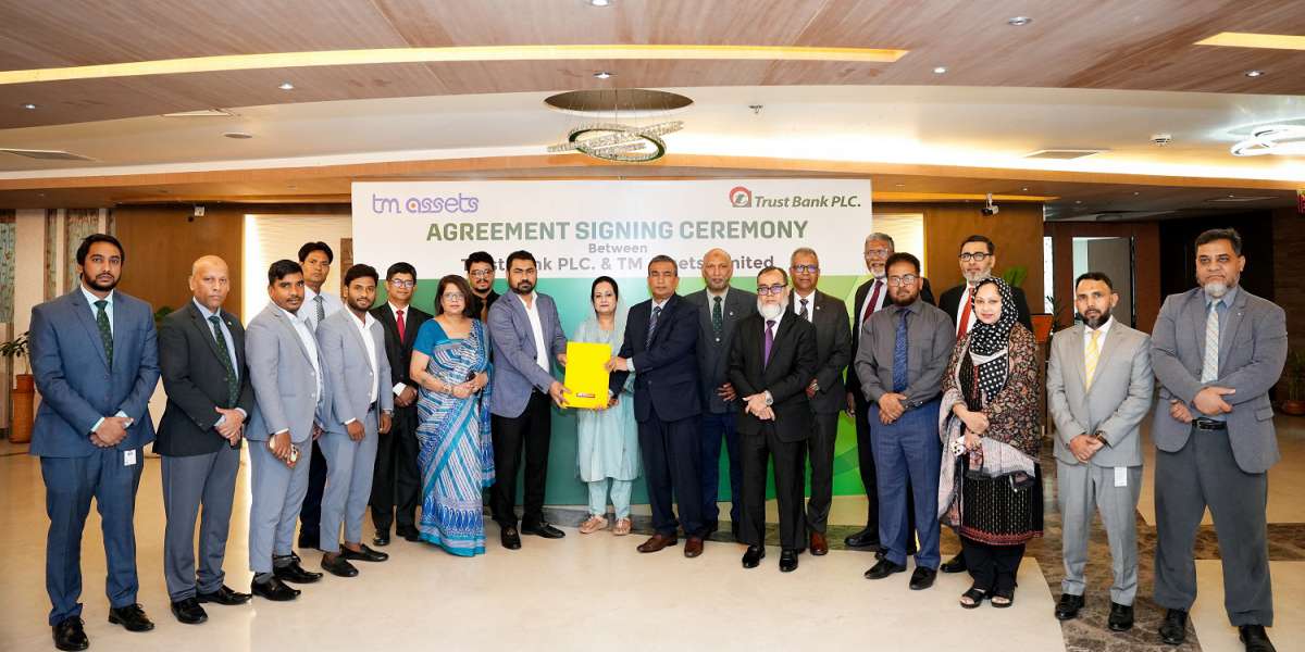 Signing ceremony between Trust Bank PLC and TM Assets Limited