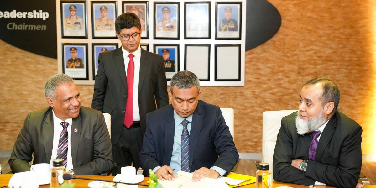 Signing ceremony between Trust Bank PLC and TM Assets Limited