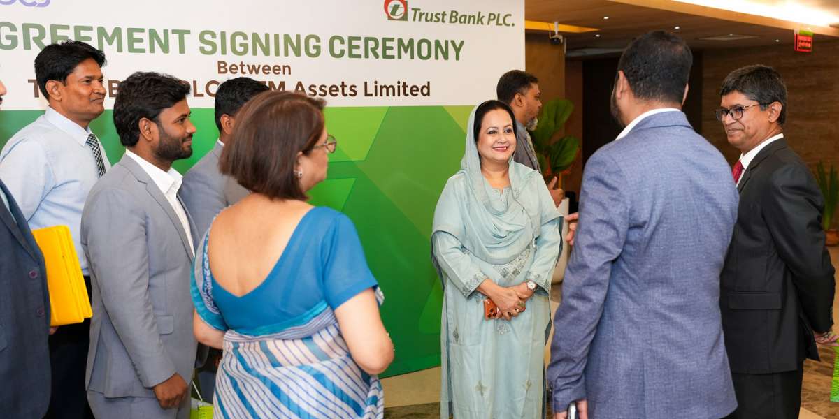 Signing ceremony between Trust Bank PLC and TM Assets Limited